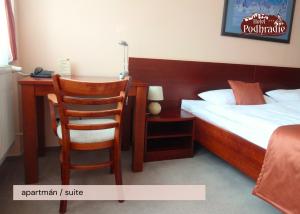Postel nebo postele na pokoji v ubytování Hotel Podhradie