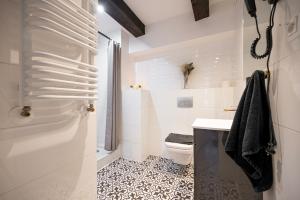 Kúpeľňa v ubytovaní Kościelna Loft Apartaments
