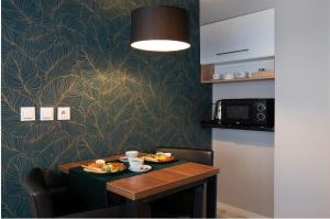 Kuchyňa alebo kuchynka v ubytovaní Kościelna Loft Apartaments