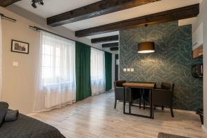 Posedenie v ubytovaní Kościelna Loft Apartaments