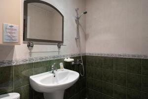 Koupelna v ubytování Zefir Hotel + 36 fotografií