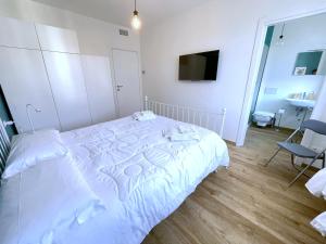 Posteľ alebo postele v izbe v ubytovaní LovingStresa 2 brand new apartment