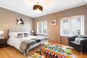 Postel nebo postele na pokoji v ubytování Exquisite Townhouse for up to 8 in Lisbon City Center