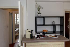 a kitchen with a counter with food on it at La Nuit des Artistes - Spacious - Stade Toulousain in Toulouse