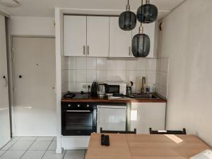 Kuchnia lub aneks kuchenny w obiekcie Charmant appartement au centre