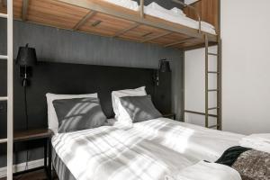 Postel nebo postele na pokoji v ubytování K7 Hotel Oslo