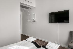 Postel nebo postele na pokoji v ubytování K7 Hotel Oslo