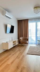 Μια τηλεόραση ή/και κέντρο ψυχαγωγίας στο Apartament No9 Double Rest Jastrzębia Góra