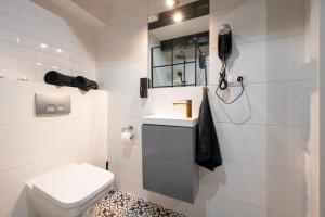Kúpeľňa v ubytovaní Kościelna Loft Apartaments