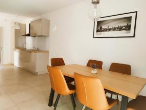 Kuchyň nebo kuchyňský kout v ubytování Apartments Merlin