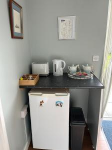 Kuchyň nebo kuchyňský kout v ubytování Wrenmar