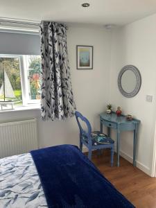 Postel nebo postele na pokoji v ubytování Wrenmar