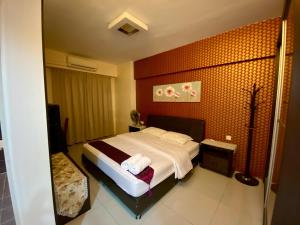Postel nebo postele na pokoji v ubytování Homestay @ Kinta Riverfront Ipoh