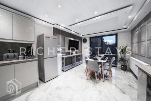 Η κουζίνα ή μικρή κουζίνα στο Hackney Suites - En-suite rooms & amenities