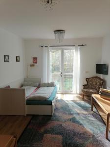 Postel nebo postele na pokoji v ubytování Gartenapartment Storchenblick + 14 fotografií