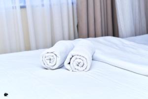 Rúm í herbergi á Cozy BnB Tsavo Gardens Imara daima