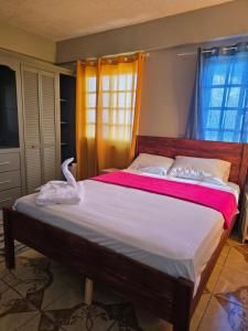 Ένα ή περισσότερα κρεβάτια σε δωμάτιο στο The Seaview Villa