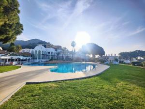 a view of a swimming pool in a resort at AP417 Los Mandarinos in El Molino