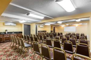 a room with rows of chairs and a whiteboard at Quality Inn & Suites Bell Gardens-Los Angeles in Bell Gardens +28 photos