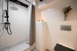 Kúpeľňa v ubytovaní Kościelna Loft Apartaments