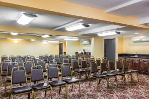 a room with rows of chairs in a room at Quality Inn & Suites Bell Gardens-Los Angeles in Bell Gardens