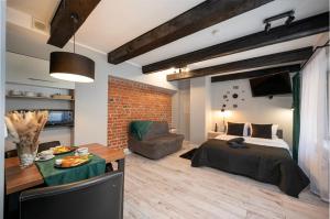 Posedenie v ubytovaní Kościelna Loft Apartaments