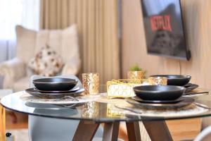 Area tempat duduk di Cozy BnB Tsavo Gardens Imara daima
