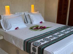 Ένα ή περισσότερα κρεβάτια σε δωμάτιο στο Casa Eywa at Ghepard Towers