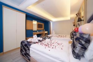 Postel nebo postele na pokoji v ubytování Downtown Sirkeci Hotel