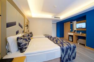 Postel nebo postele na pokoji v ubytování Downtown Sirkeci Hotel