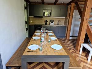 Kuchyň nebo kuchyňský kout v ubytování Pavillon Kalensa