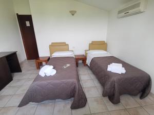Postel nebo postele na pokoji v ubytování Agriturismo Terra dei Sassi