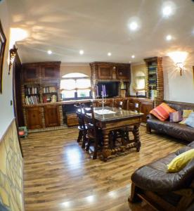 Posedenie v ubytovaní Green Peaks B&B Country House Alojamiento Rural