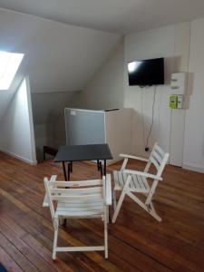 Televisyen dan/atau pusat hiburan di Le GM - appartement proche gare et commerces