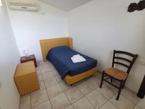 Postel nebo postele na pokoji v ubytování Agriturismo Terra dei Sassi