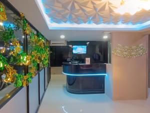 a room with christmas decorations on the walls at New Arcadia Residence in Jakarta