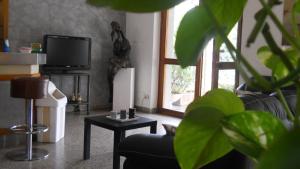TV a/nebo společenská místnost v ubytování Hotel Diana