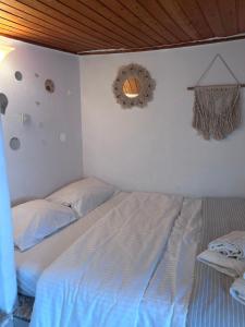 Ένα ή περισσότερα κρεβάτια σε δωμάτιο στο Cycladic experience