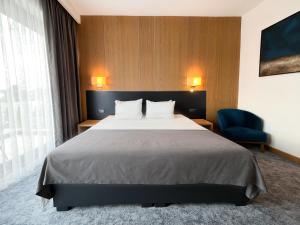 Ένα ή περισσότερα κρεβάτια σε δωμάτιο στο GAZDA Hotel&Restaurant - Self Chek-In