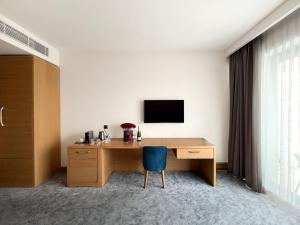 Μια τηλεόραση ή/και κέντρο ψυχαγωγίας στο GAZDA Hotel&Restaurant - Self Chek-In