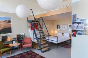 Postel nebo postele na pokoji v ubytování Fabrika Hostel & Suites