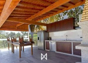 Η κουζίνα ή μικρή κουζίνα στο MyStay - Quinta da Espinheira Luxury Villa