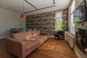 Posezení v ubytování B&B Dennenbos