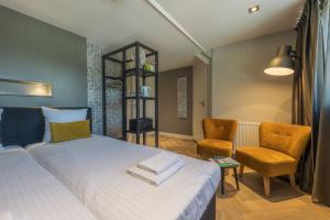 Postel nebo postele na pokoji v ubytování B&B Dennenbos
