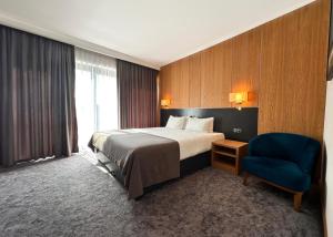 Ένα ή περισσότερα κρεβάτια σε δωμάτιο στο GAZDA Hotel&Restaurant - Self Chek-In