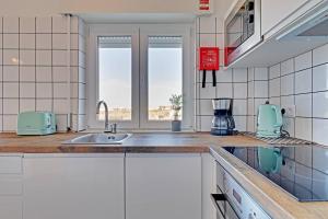 Kuchyň nebo kuchyňský kout v ubytování Sea Salt, Sagres Apartment