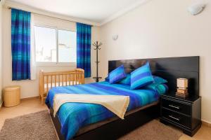 Postel nebo postele na pokoji v ubytování Apartment with parking in Rabat Central Location + 12 fotografií