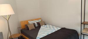 Ένα ή περισσότερα κρεβάτια σε δωμάτιο στο Cozy room in Nagold with Private Facilities