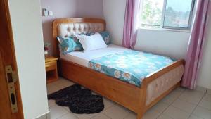 Postel nebo postele na pokoji v ubytování Residence la Flamboyance