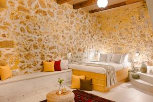 a bedroom with a bed and a tub and a sink at Giota's House in Chania Town +11 photos